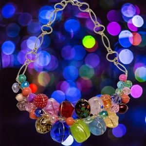 Fun Abra Couture crazy combo section necklace in gold.